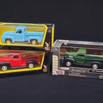 Lot 030-MT: Die-cast Pickup Trio #2

Features:
â€¢	Lucky Die Cast 1953 Ford F-100 Pickup
â€¢	Lucky Die Cast 1950 GMC Pickup
â€¢	Motor Max...