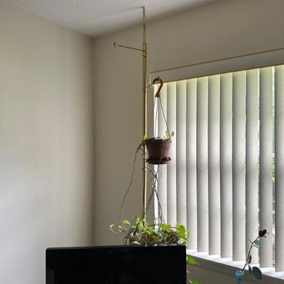 Pair of MCM Tension Pole for hanging plants has 3 rungs. each