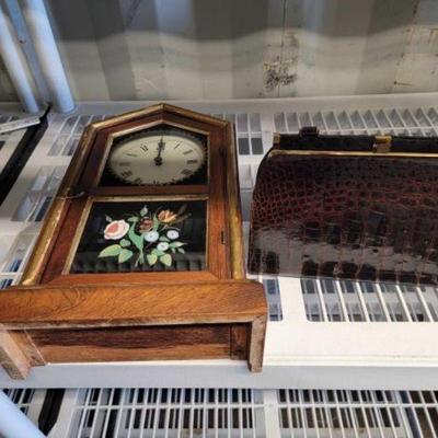 #4048 â€¢ Vintage Wooden Clock and Snakeskin Handbag
