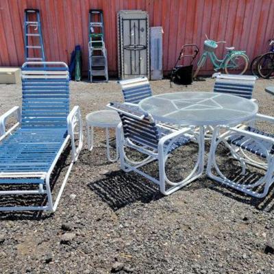 #80310 â€¢ Patio table and chairs, 5 chairs one large table one small table
