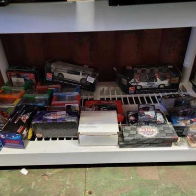 #6144 â€¢ Shelf of Nascar Collectables & Toys

