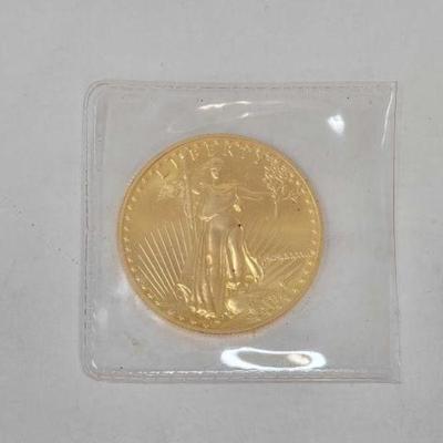 #1208 â€¢ 1987 1oz. Fine Gold $50 Dollar Eagle Coin
