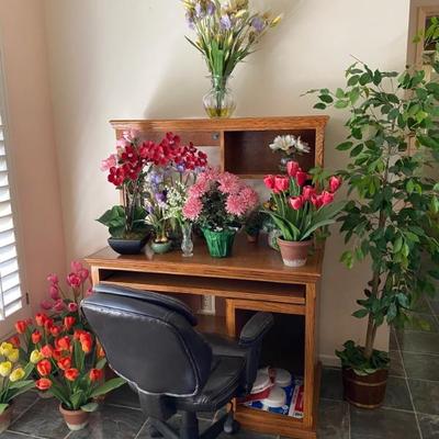 Desk and faux plants 
