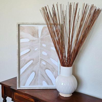 Framed Monstera Leaf Print in Neutral Tones and White Ceramic Vase w/ Dried Decorative Grass BundleÂ 