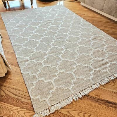 Lot #16 - Area Rug - 5ft x 7.5ft. Thick Woven Wool with Fringe - Trellis Pattern White on Grey - Can use Either Side