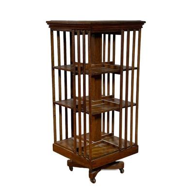 Oak Revolving Bookcase | Oak three-tier revolving library bookcase. - l. 20 x w. 20 x h. 45 in
