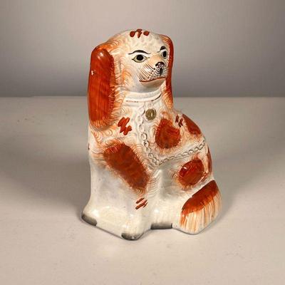 Staffordshire Spaniel | 19th C Staffordshire Spaniel nicely painted in red. - l. 5.5 x w. 3 x h. 8 in
