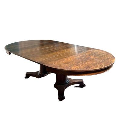 Oak Round Table | Oak round dining room table with 6 leaves. - l. 54 x w. 54 x h. 30.5 in (Table without leaves. Leaves are 8â€
