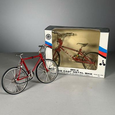 (2pc) Price Products Die Cast Bikes | Lot Includes (2) Price Products Die Cast Bikes: (1) MIB BM-X Bike #1988 (1) Mountain Bike. - l. 7.5...