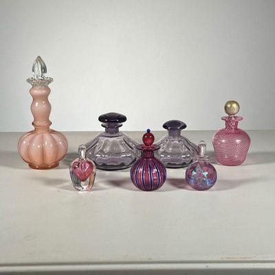 (7pc) Pink & Purple Glass Perfume Bottles | Includes pink & purple colored blown glass perfume bottles. - h. 3 x dia. 4.5 in
