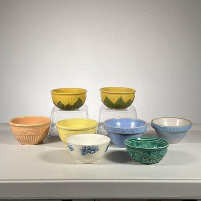 (8pc) Shawnee Pottery Bowls | Lot includes: (2) Shawnee Corn bowls. (5) Coloured Bowls. (1) Blue Flower bowl. - h. 2.75 x dia. 5 in
