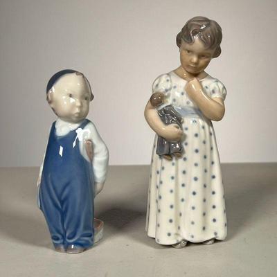 (2pc) Royal Copenhagen Boy & Girl | Lot includes: #3250 Little Boy with broom #3539 Little Girl with doll. - l. 2 x w. 2 x h. 5.75 in
