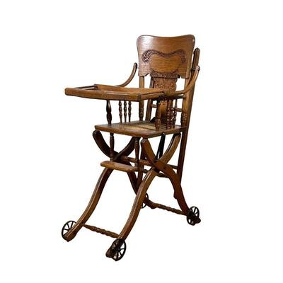 Oak High Chair | Childâ€™s oak high chair with carved back. - l. 18 x w. 21 x h. 38.5 in
