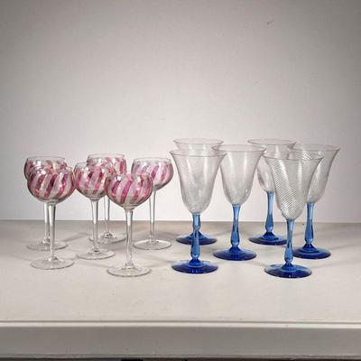 (12pc) Coloured Glass Stemware | Lot includes: (6) Tall with clear swirled top and blue base. (6) Round with red and white top and clear...