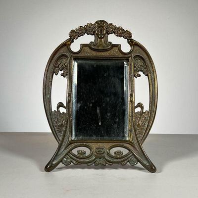Cast Metal Mirror | Small beveled glass mirror set in cast metal frame featuring swans, flora & fauna, and bust of woman on top. - w....