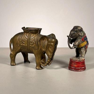 (2pc) Metal Elephant Coin Bank | Includes: large metal elephant coin bank & small painted metal circus elephant coin bank. - l. 6 x w....