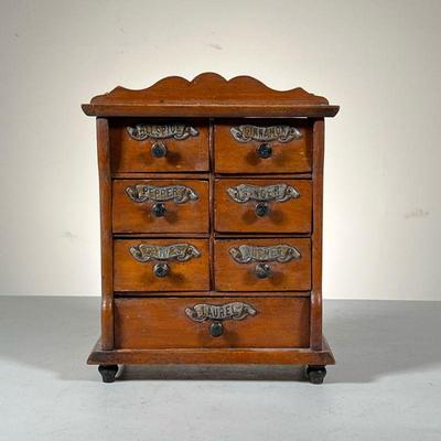 Spice Chest | Great Spice Chest with turnip feet, 7 drawers and attached scrolled metal nameplates. - l. 7.5 x w. 3 x h. 9.75 in 
