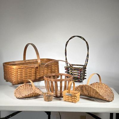  (7pc) Vintage Baskets | Lot includes: (1) Large Farm Basket. (1) Paint Decorated Stick Basket. (2) Splint Display Baskets. (1)...