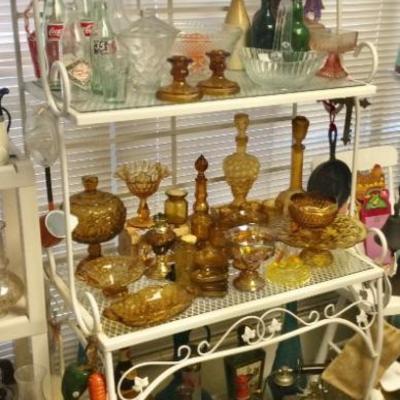 Bakers rack, colored glassware 