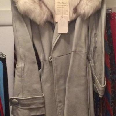 Leather jacket with fox collar