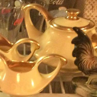 Yellow tea pot with sugar and creamer