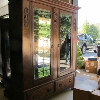 Armoire with custom Mirror backing and heavy duty Glass Shelves.  Built in 1800's