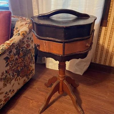 Hat box on antique stand 