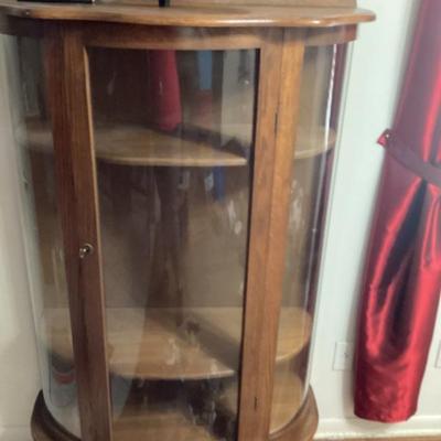Vintage curved glass curio cabinet 