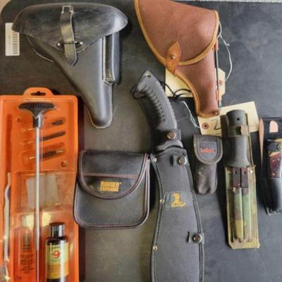 #2002 â€¢ Holsters, knives, Gun Cleaning Kit,Binoculars
