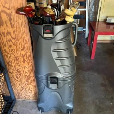 Golf clubs and hard bag