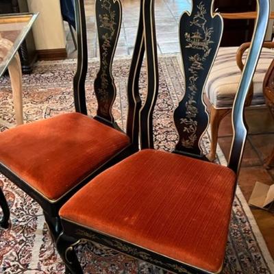 6 black and gold chairs