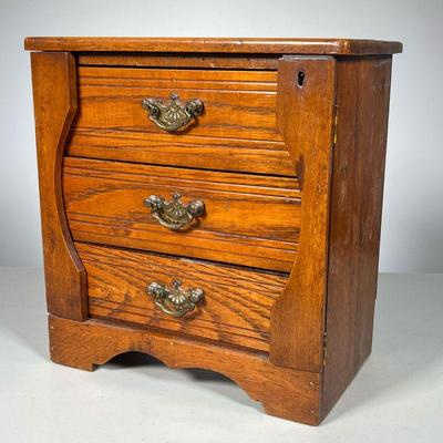 MINIATURE SIDE-LOCK CHEST | Chest with Walnut case and oak drawers. Brass handles and side-locks with keyNice Patina. 