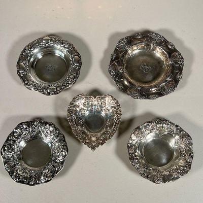 (5pc) GORHAM STERLING SILVER BOWLS | Including four embossed sterling low form dishes (largest dia. 6.75 in.), plus a heart-form dish...