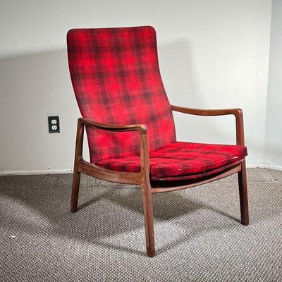 JOHN STUART FOR FRANCE & SONS ARMCHAIR | Red plaid upholstered backrest and seat suspended from a teak wood frame; underside with John...
