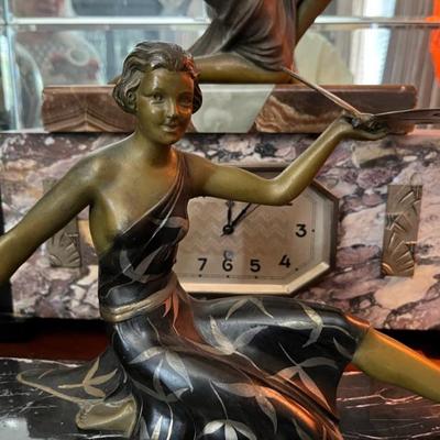 French Art Deco spelt sculpture of a woman with butterflies, bronze finish and marble base, one butterfly needs to soldered back on