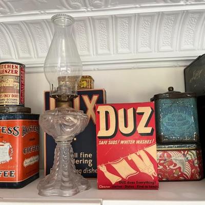 lots of antique tins with brand logos--Star Lard, Utz potato chips, Oxydol, Campfire Marshmallows, Duz laundry soap, Lifebuoy, and more