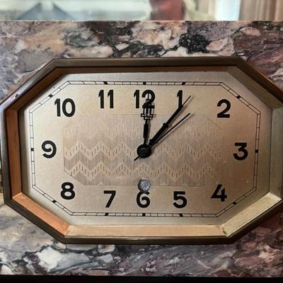 Art Deco style mantel clock in a marble case, 24"l, maker unknown