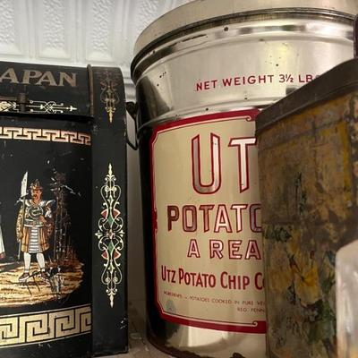 lots of antique tins with brand logos--Star Lard, Utz potato chips, Oxydol, Campfire Marshmallows, Duz laundry soap, Lifebuoy, and more
