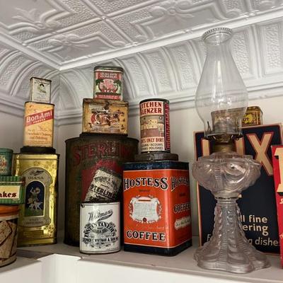 lots of antique tins with brand logos--Star Lard, Utz potato chips, Oxydol, Campfire Marshmallows, Duz laundry soap, Lifebuoy, and more