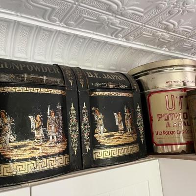 lots of antique tins with brand logos--Star Lard, Utz potato chips, Oxydol, Campfire Marshmallows, Duz laundry soap, Lifebuoy, and more