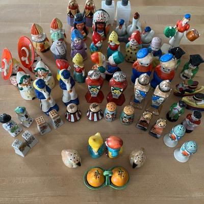 lots of vintage and antique salt and pepper shakers, ceramic, some figural, some floral, some opalescent, mostly made in Japan
