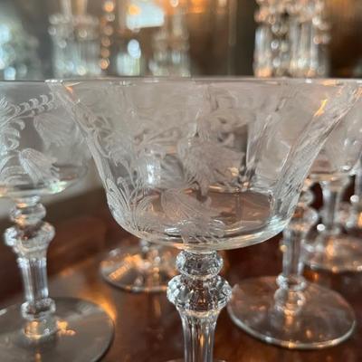 Set of 1920s, 1930s Tiffin crystal stemware â€œFuchsiaâ€
10 coupes, champagne glasses, sherbet glasses
9 small wine glasses, dessert...