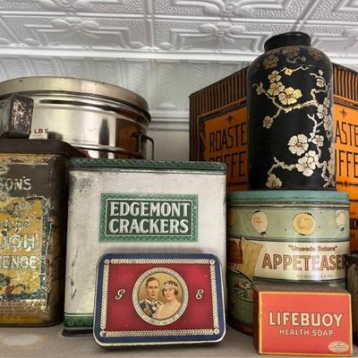 lots of antique tins with brand logos--Star Lard, Utz potato chips, Oxydol, Campfire Marshmallows, Duz laundry soap, Lifebuoy, and more