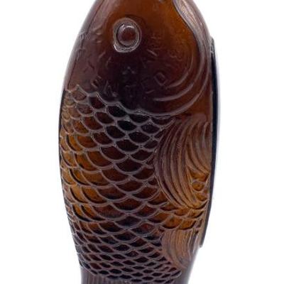 Antique bitters bottle, embossed â€œ The Fish Bitters/ W.H. Ware Patented 1866. Excellent cond. ht. 11 5/8â€