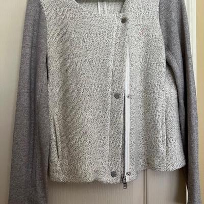 Sweater/ medium, new, when closed material covers buttons and zipper $45