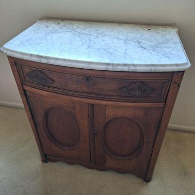 Small wood cabinet with marble top
26x28x16
