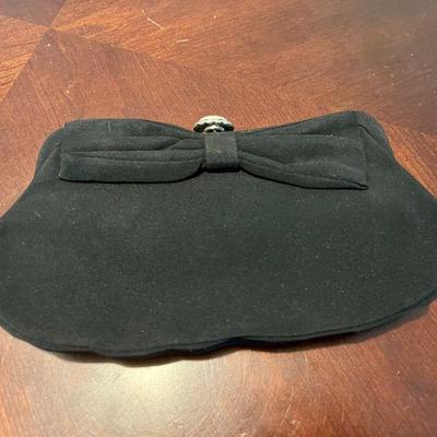 Lot 013-LOC: Vintage â€œTinaâ€ Evening Clutch 

Features: Vintage black evening clutch with faux pearl clasp with attached coin purse...