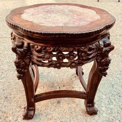 Lot 008-DG: Small Antique Carved Wooden Side Table 

Features: 
â€¢	Short, ornately-carved table with a pink marble-inlaid top
â€¢	May be...