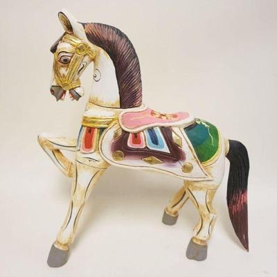 1175	TABLE TOP CARVED CAROUSEL HORSE, APPROXIMATELY 22 IN X 24 IN HIGH
