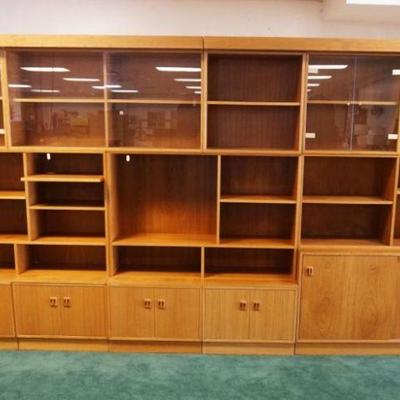 1032	DANISH WALNUT MODULAR WALL UNIT W/HOODED TOP LIGHTING, APPROXIMATELY 143 IN X 16 IN X 78 IN HIGH
